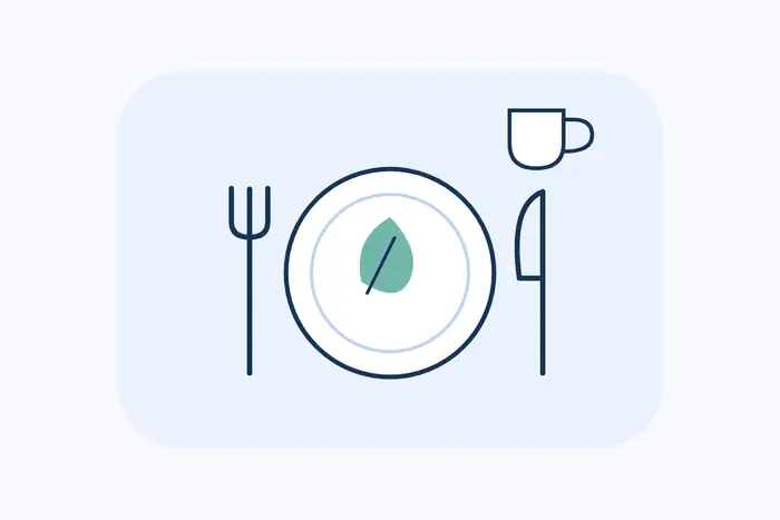 Plate, cutlery and a coffee cup.
