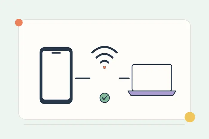 A phone sharing a wireless connection with a laptop.